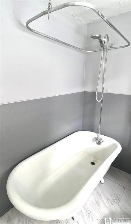 1504 River St, Olean, NY 14760 - bathroom with a freestanding bath, marble finish floors, and a shower
