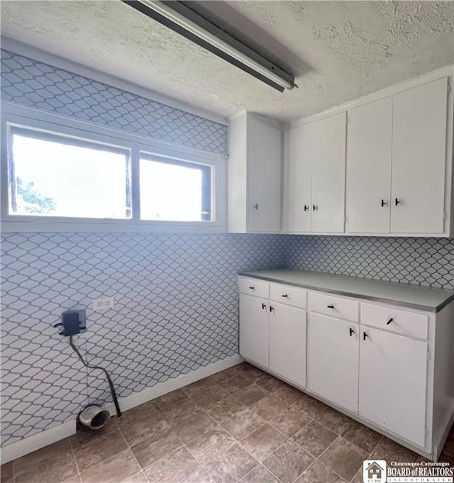 1504 River St, Olean, NY 14760 - washroom with a textured ceiling