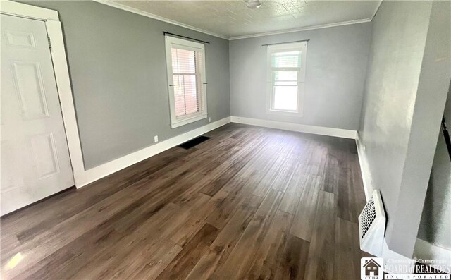 1504 River St, Olean, NY 14760 - empty room featuring dark wood-style flooring and crown molding