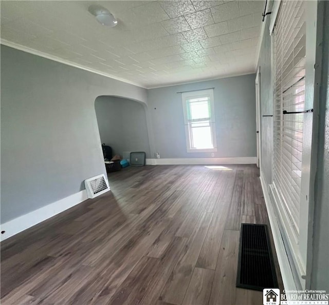 1504 River St, Olean, NY 14760 - unfurnished room with arched walkways, wood finished floors, and ornamental molding