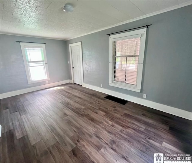 1504 River St, Olean, NY 14760 - unfurnished room featuring ornamental molding and dark wood-style flooring