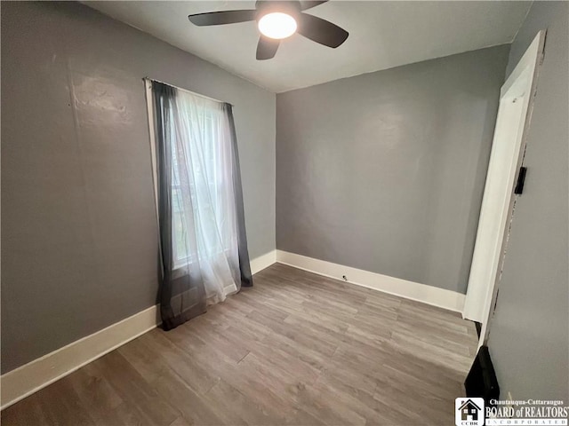 1504 River St, Olean, NY 14760 - spare room featuring a ceiling fan and wood finished floors