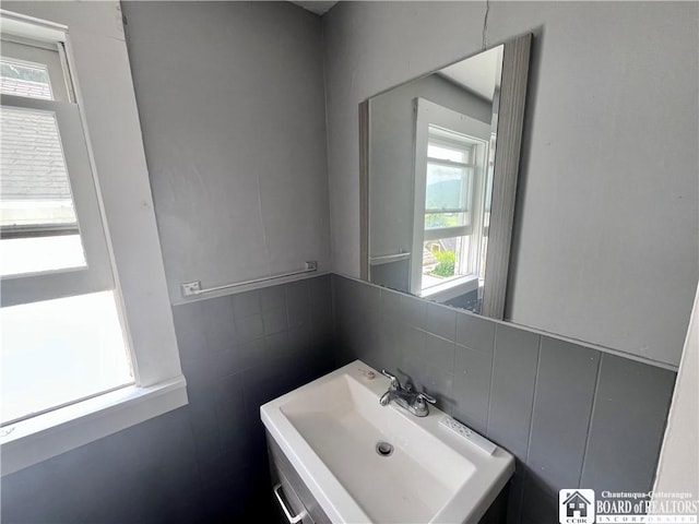 1504 River St, Olean, NY 14760 - bathroom featuring tile walls and a sink