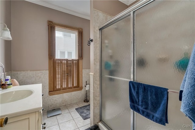 147 Park Ave, Watertown City, NY 13601 - full bath with tile walls, a shower stall, ornamental molding, vanity, and tile patterned floors