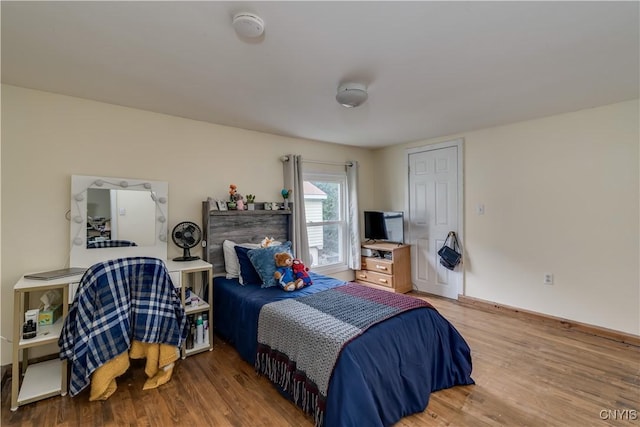 147 Park Ave, Watertown City, NY 13601 - bedroom featuring wood finished floors and baseboards