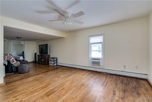 147 Park Ave, Watertown City, NY 13601 - unfurnished living room featuring a baseboard heating unit, wood finished floors, and ceiling fan