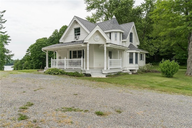 32227 County Route 22, Antwerp, NY 13691 - view of front of property featuring covered porch and a front lawn