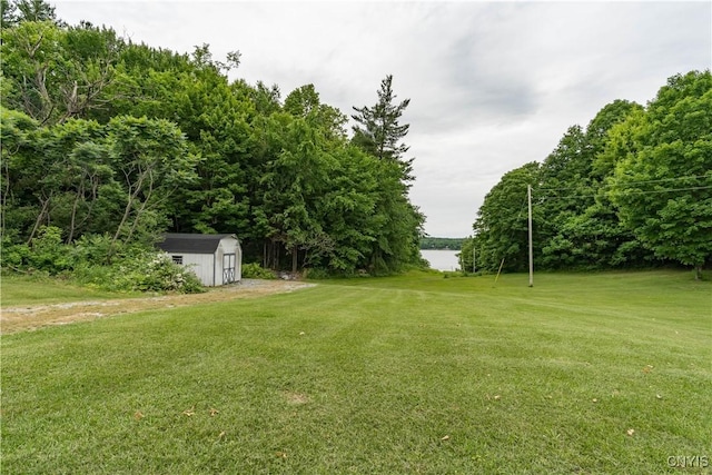 32227 County Route 22, Antwerp, NY 13691 - view of grassy yard featuring a storage shed and a water view
