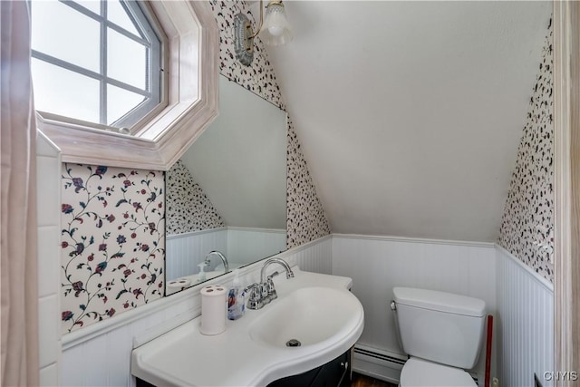 32227 County Route 22, Antwerp, NY 13691 - bathroom with a baseboard heating unit, a wainscoted wall, wallpapered walls, and vanity