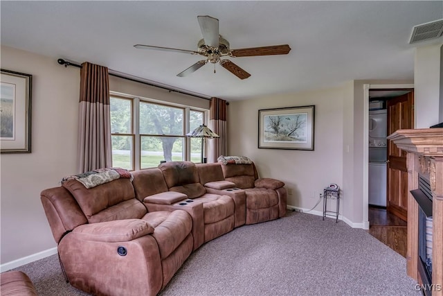 32227 County Route 22, Antwerp, NY 13691 - living area with carpet, a ceiling fan, and a fireplace