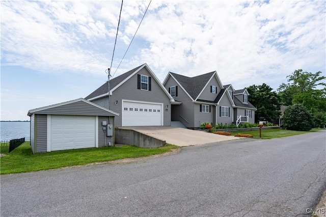 28005/08 Stony Point Rd, Cape Vincent, NY 13618 - traditional-style house with a garage, a front lawn, and driveway