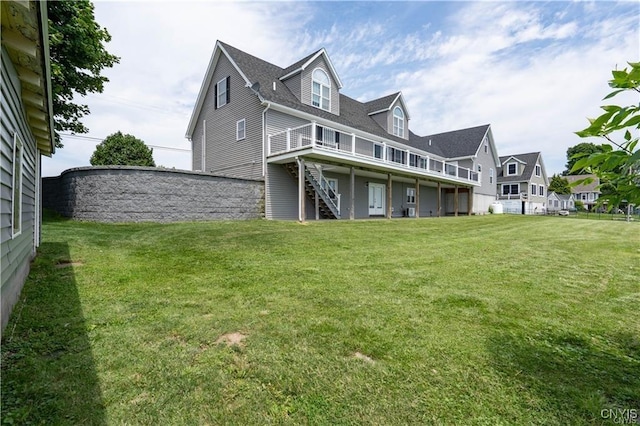 28005/08 Stony Point Rd, Cape Vincent, NY 13618 - back of property with a deck, a lawn, and stairway