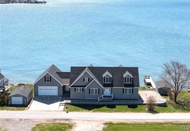 28005/08 Stony Point Rd, Cape Vincent, NY 13618 - view of front of property featuring a garage, driveway, and a water view