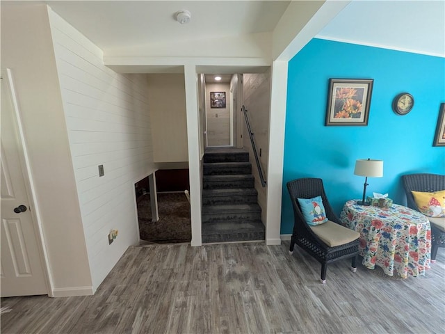 1525 S Ave, Lewis Run, PA 16738 - sitting room with wood finished floors, stairway, and wooden walls