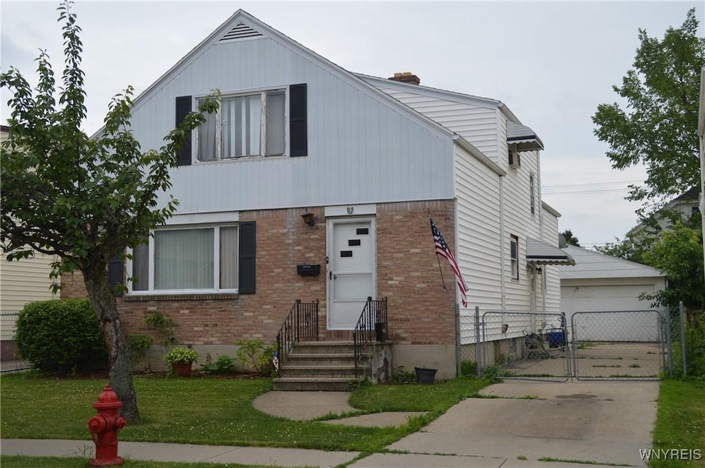 81 Elmhurst Pl, Buffalo, NY 14216 - view of front of home featuring brick siding and a gate