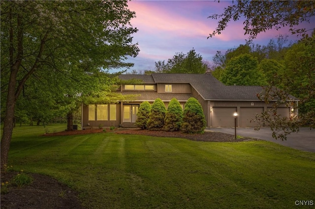 3313 Thompson Rd, Cazenovia, NY 13035 - mid-century modern home with a garage, concrete driveway, and a front lawn