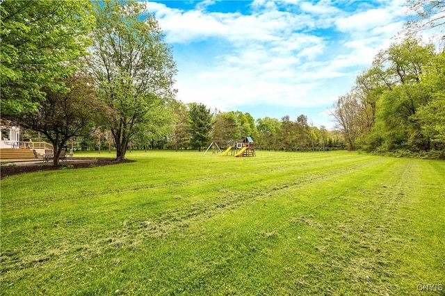 3313 Thompson Rd, Cazenovia, NY 13035 - view of grassy yard featuring a playground