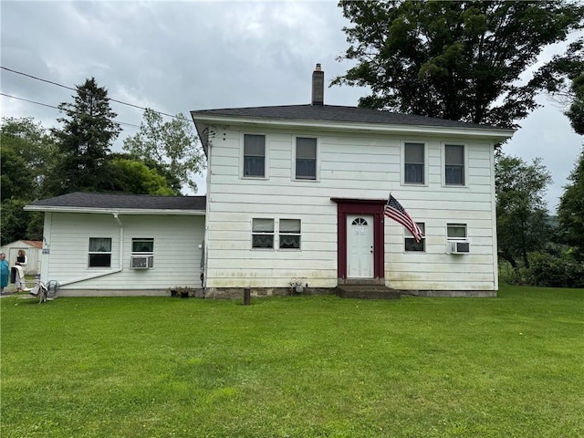 6463 County Road 20, Friendship, NY 14739 - back of house featuring entry steps, a chimney, a yard, cooling unit, and a shingled roof