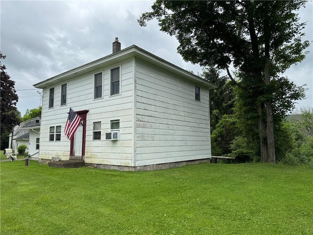 6463 County Road 20, Friendship, NY 14739 - view of front of home featuring a chimney, a front lawn, and cooling unit