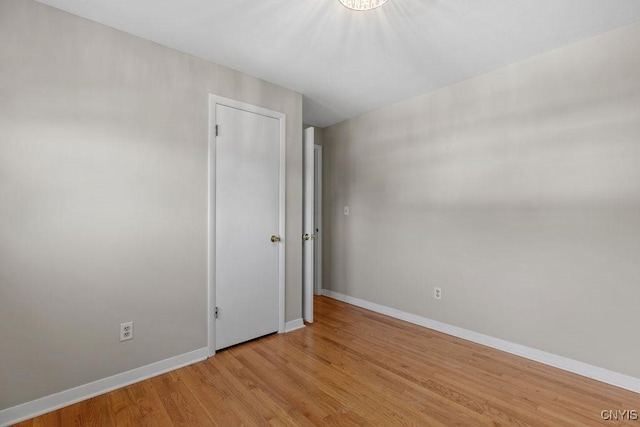 113 Craig Cir, Dewitt, NY 13214 - empty room featuring wood finished floors and baseboards