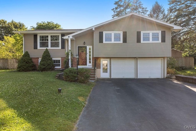 113 Craig Cir, Dewitt, NY 13214 - bi-level home featuring a garage and asphalt driveway