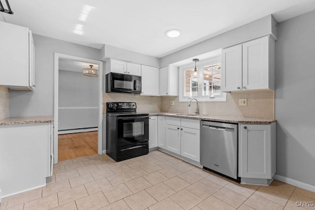 113 Craig Cir, Dewitt, NY 13214 - kitchen with black appliances, baseboard heating, white cabinets, and backsplash