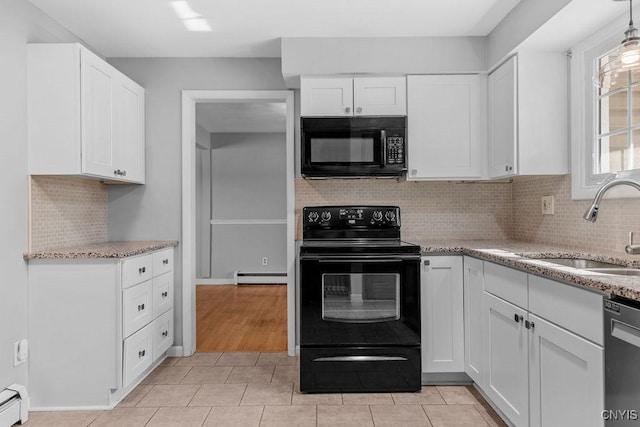 113 Craig Cir, Dewitt, NY 13214 - kitchen featuring black appliances, a baseboard heating unit, white cabinets, and light stone counters
