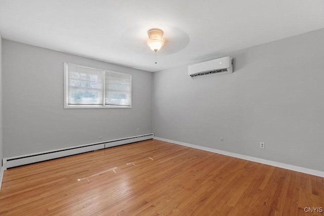 113 Craig Cir, Dewitt, NY 13214 - unfurnished room with a baseboard heating unit, a wall mounted air conditioner, ceiling fan, and wood finished floors