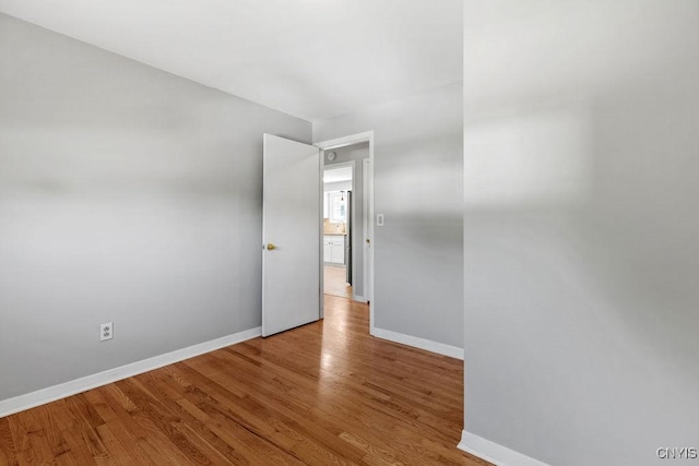 113 Craig Cir, Dewitt, NY 13214 - unfurnished room with wood finished floors and baseboards