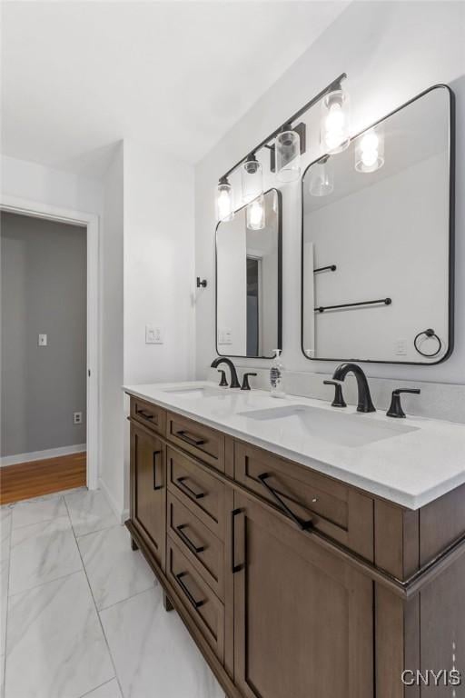113 Craig Cir, Dewitt, NY 13214 - bathroom featuring double vanity and marble finish flooring