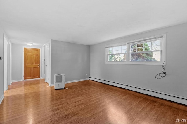 113 Craig Cir, Dewitt, NY 13214 - spare room with a baseboard radiator and light wood-type flooring