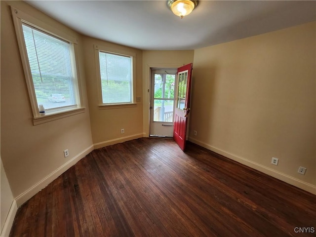 114 Stevens Pl, Syracuse, NY 13210 - unfurnished room with dark wood-type flooring and baseboards