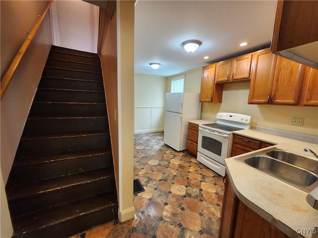 114 Stevens Pl, Syracuse, NY 13210 - kitchen with white appliances, light countertops, and recessed lighting