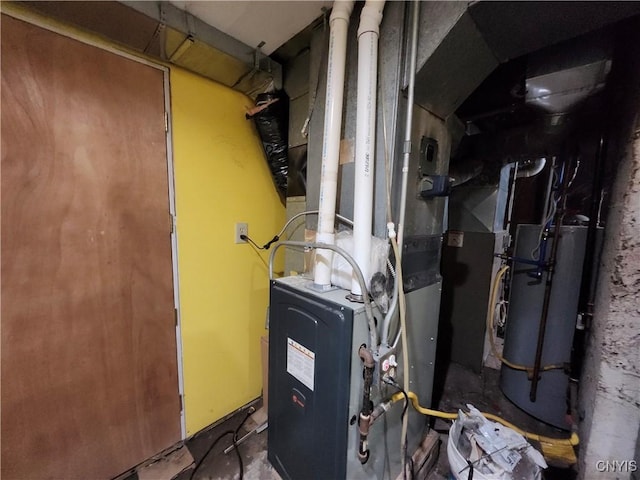 114 Stevens Pl, Syracuse, NY 13210 - utility room featuring gas water heater