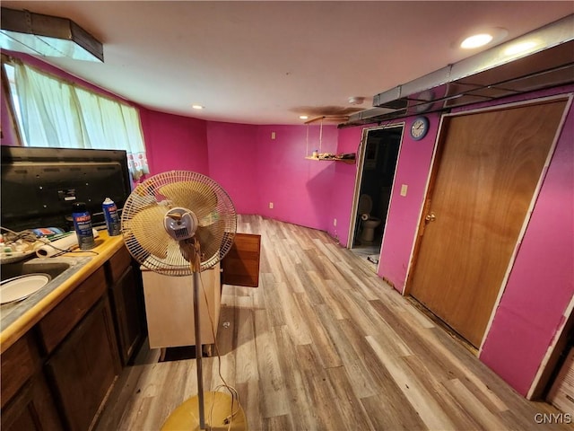 114 Stevens Pl, Syracuse, NY 13210 - recreation room featuring light wood finished floors and a sink