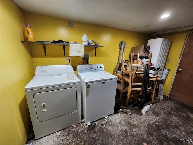 114 Stevens Pl, Syracuse, NY 13210 - laundry area with washer and clothes dryer