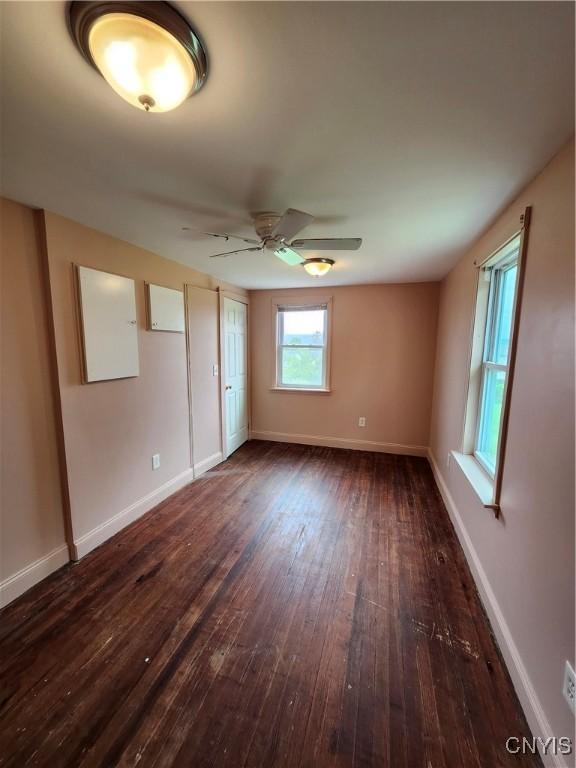 114 Stevens Pl, Syracuse, NY 13210 - spare room with dark wood finished floors and ceiling fan