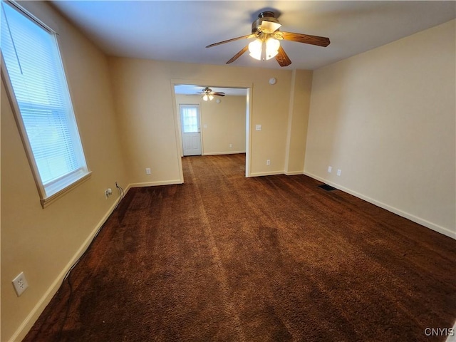 114 Stevens Pl, Syracuse, NY 13210 - carpeted spare room with ceiling fan and baseboards