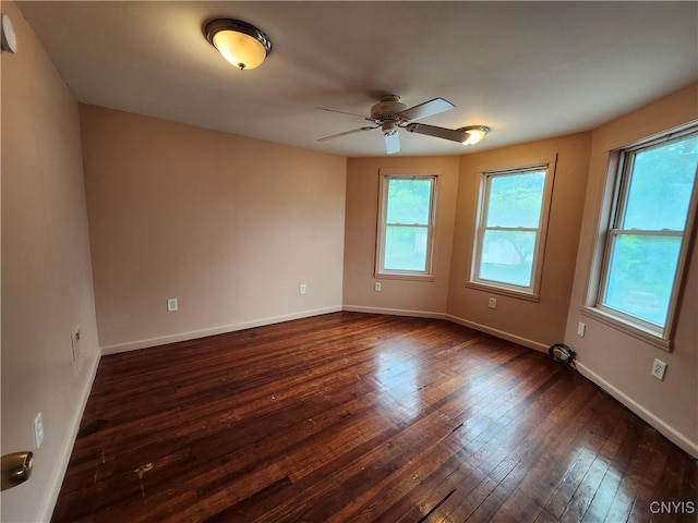 114 Stevens Pl, Syracuse, NY 13210 - spare room featuring dark wood-type flooring and a ceiling fan
