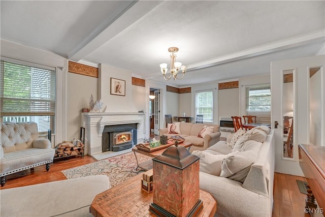 6188 Lake St, Aurelius, NY 13034 - living area with beamed ceiling, wood finished floors, and a chandelier