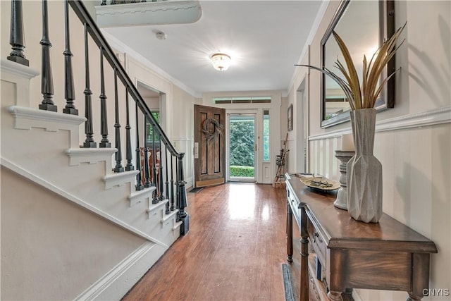 6188 Lake St, Aurelius, NY 13034 - entrance foyer with stairway, wood finished floors, and crown molding