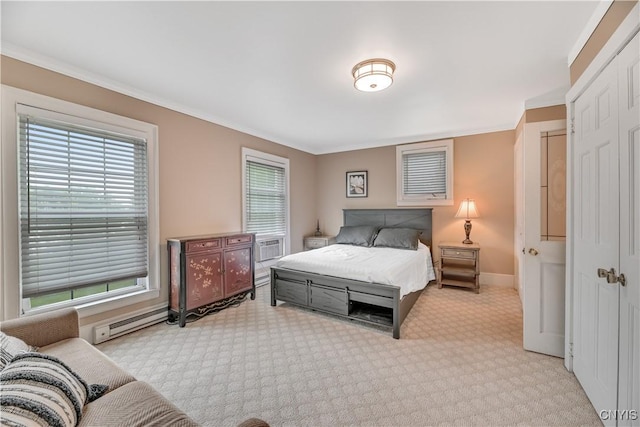 6188 Lake St, Aurelius, NY 13034 - carpeted bedroom with crown molding, baseboard heating, and a closet