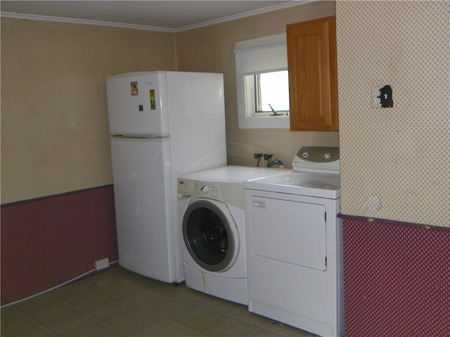 202-204-206 N Monroe St, Reading, NY 14891 - laundry room with washer and clothes dryer, wallpapered walls, ornamental molding, tile patterned floors, and cabinet space