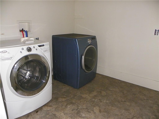 202-204-206 N Monroe St, Reading, NY 14891 - laundry room with washing machine and dryer and tile patterned floors