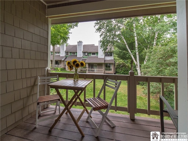 29 Elm Ln Unit 24, Chautauqua, NY 14722 - view of wooden balcony featuring a deck and a residential view