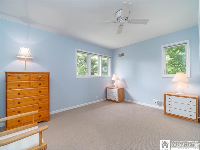 29 Elm Ln Unit 24, Chautauqua, NY 14722 - carpeted bedroom featuring baseboards and ceiling fan