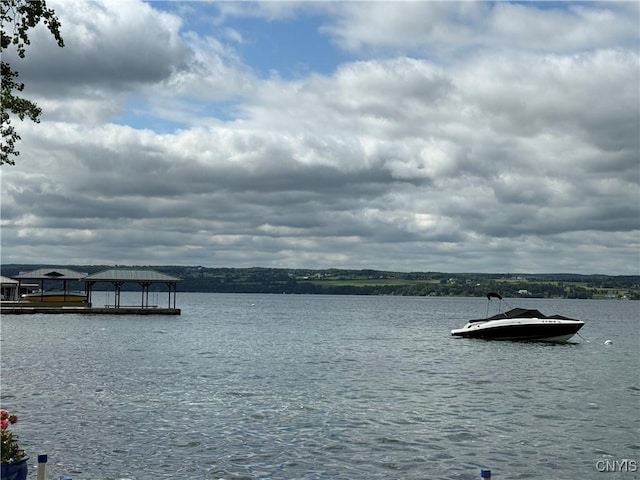 2487 E Lake Rd, Spafford, NY 13152 - water view featuring a boat dock