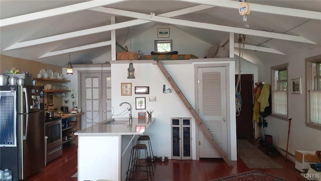 2487 E Lake Rd, Spafford, NY 13152 - kitchen with stainless steel appliances, beam ceiling, a breakfast bar, dark wood-style flooring, and french doors
