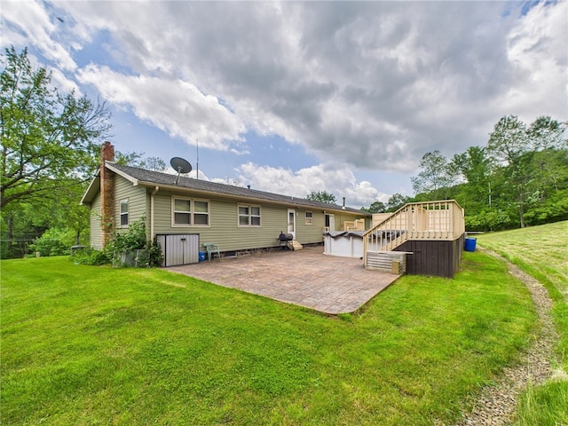 1029 Barden Brk, Ceres, PA 16731 - back of house featuring a patio, a chimney, a lawn, and a wooden deck