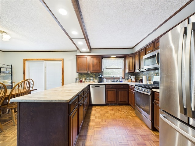 1029 Barden Brk, Ceres, PA 16731 - kitchen with stainless steel appliances, light countertops, a peninsula, a textured ceiling, and recessed lighting